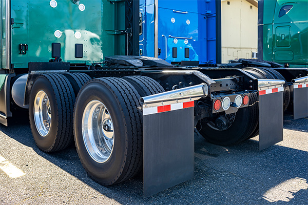 Mud flap of a truck made from thermoplastics