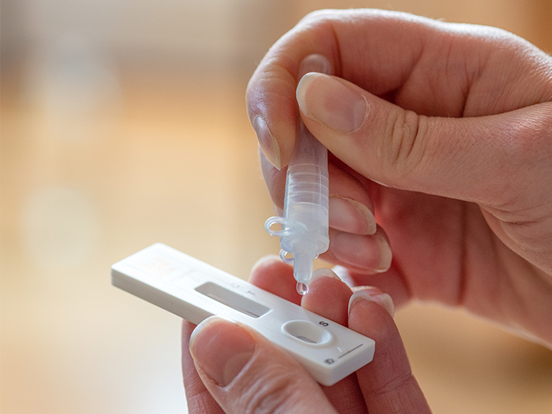 Close-up of a plastic self-test being carried out