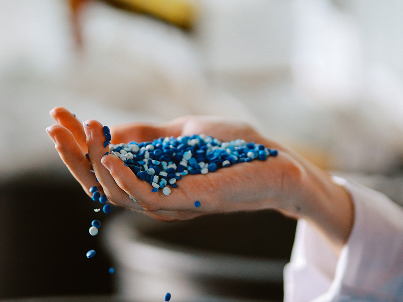 A handful of colored thermoplastic granules