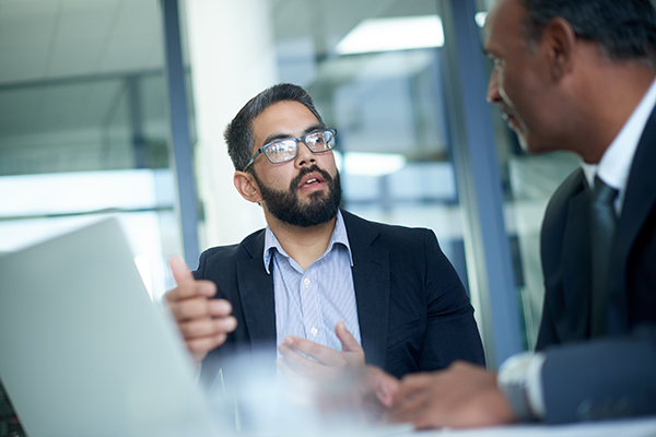 Two male persons in a business conversation